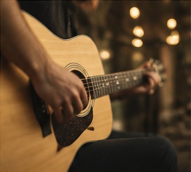 Acoustic guitarist at the Lawn Bar